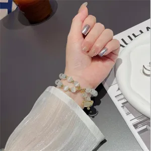 Chique kattenoog steen kralen armband en riem accessoire, elegant dubbel design voor zomer.