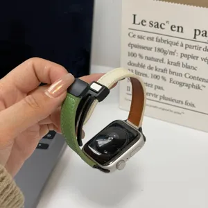 Detail view of dual-color litchi grain leather magnetic watch strap compatible with Apple Watch.