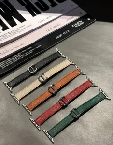 Leather strap for Apple Watch with folding buckle, slim design, multi-color options.