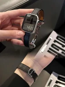 Slim leather watch strap for Apple Watch SE Series 8 7 6 with elegant folding deployant clasp.