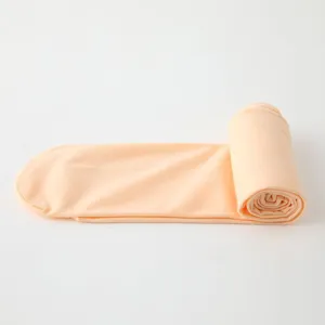 Detailed view of elastic children dance ballet tights rolled up soft fabric closeup photo