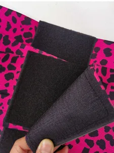 Pink leopard print waist trainer detail view, tummy control corset and adjustable support belt.