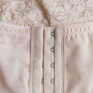 High-waisted postpartum tummy control shapewear panty with breathable mesh and hooks.