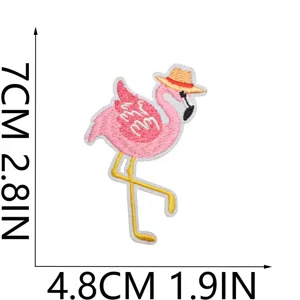 Cute pink flamingo embroidered patch with hat and sunglasses, measuring 7x4.8cm for DIY decor.