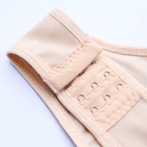 Close-up detail of flesh-colored body shaper hook and eye closure with breathable mesh fabric.
