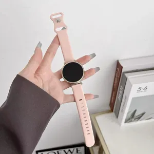 Pink silicone smartwatch replacement strap detail view, soft and comfortable daily wear.