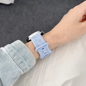 Cinturino di ricambio in silicone con dettaglio a motivo floreale, accessorio comodo.
