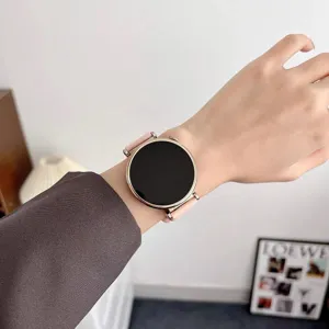 Elegant round smartwatch with pink silicone strap and rose gold case for daily wear.