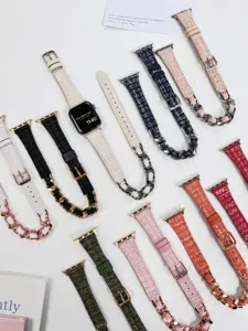 Detailansicht hochwertiger Tweed- und Ketten-Uhrenarmbänder im modischen Design.