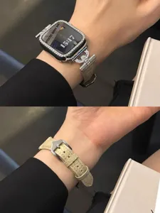 Luxury rhinestone Apple Watch case and leather strap set with chic metal connector link.