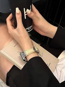 Luxury rhinestone leather strap compatible with Apple Watch, elegant lifestyle detail shot.