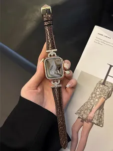 Detailed view of luxury rhinestone leather watch strap and sparkly case for smart watch.