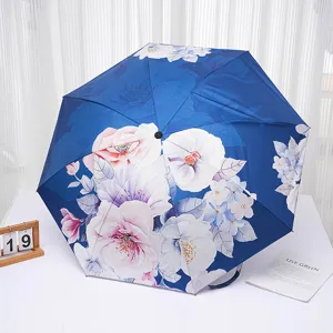 Floral print folding sun umbrella open display, UV protection double layer rainy and sunny use.