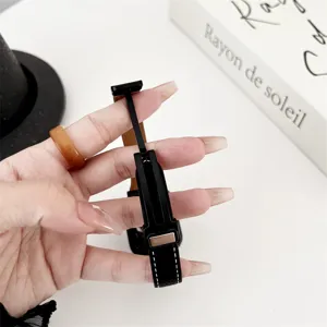 Black leather slim magnetic watch band detail for smart watch compatible replacement strap design