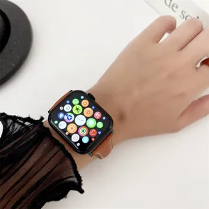 Close-up detail shot of litchi pattern leather smartwatch band worn gracefully on wrist.