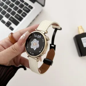 White genuine leather watch strap with magnetic folding buckle, stylish for smartwatches.