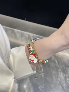 Bracelet Apple Watch en perles d'argile de Noël avec charmant pendentif Père Noël iWatch.