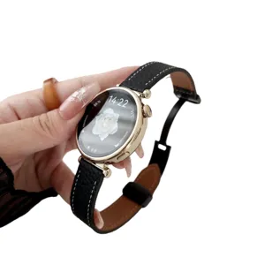 Smartwatch with gold round case, black litchi pattern leather strap, and clear digital display face.