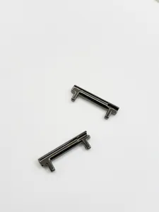 Metal watch strap connector detail view, black alloy adapter for smart watch bands.