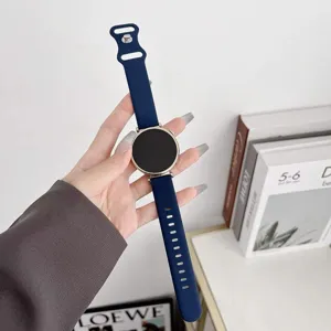 Replacement silicone watch strap for smartwatches, flexible and durable band with secure clasp.
