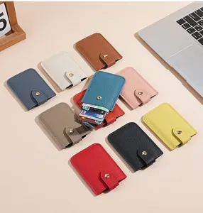 Detail view of multi-color genuine leather card holder, minimalist slim pocket wallet.
