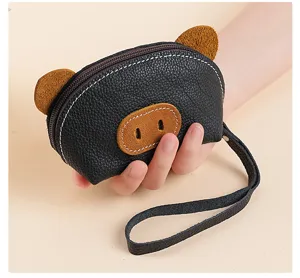 Cute black leather pig coin purse with wrist strap, mini portable key pouch and card holder.