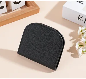 Black genuine cowhide leather mini short wallet for women, compact card holder and coin purse.