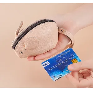 Cute leather mouse coin purse detail showing soft texture, zipper closure and mini wrist strap.