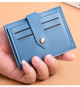 Blue PU leather minimalist card holder wallet with multiple slots and snap button closure detail.