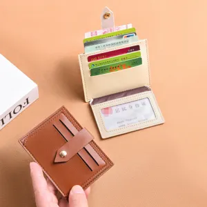 Compact PU leather card holder with multi-card slots and secure snap closure for daily use.