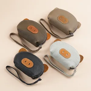 Cute pig leather coin purse mini hand clutch wallet key card storage bag with wrist strap.