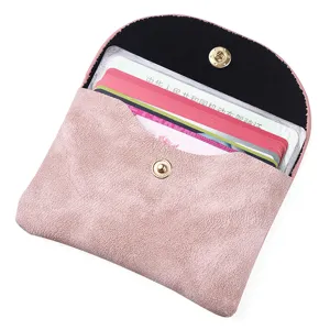 Pink soft leather card holder mini coin purse portable wallet with snap closure for women.
