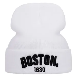 White knitted beanie hat with black Boston 1630 embroidery for winter warmth and outdoor style.