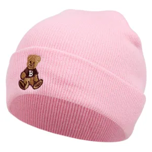 Cute pink knit beanie for winter, featuring an adorable embroidered brown bear with letter B.