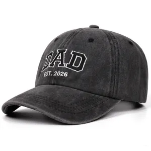 Vintage washed black dad baseball cap with white embroidered text detail and adjustable strap.