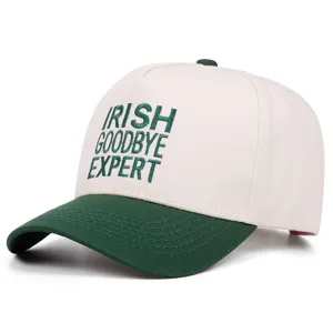 Close-up detail of the green and white embroidered baseball cap with Irish goodbye text design