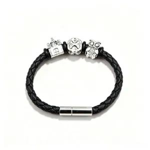 Men's black braided leather bracelet featuring metal charms and a sleek magnetic clasp.