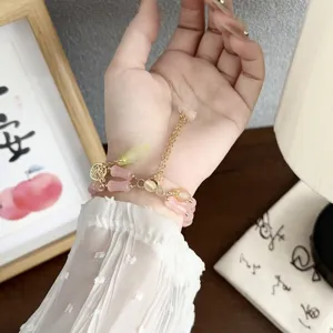Chinese stijl roze kralen armband voor horlogeband accessoire met prachtig detail.