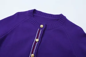 Purple knit cardigan for women, featuring a classic round neck and stylish striped placket detail.