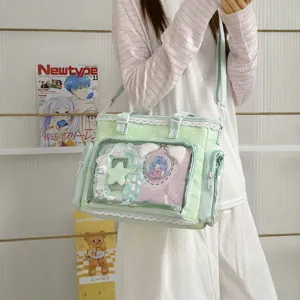 Bellissima borsa a tracolla ita Lolita verde con finestra trasparente e pizzo