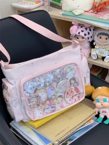 Pink Japanese JK style ita bag with clear window and anime badges for students daily use