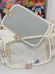 Detail view of the Japanese JK uniform canvas shoulder bag with clear window and mesh layer.