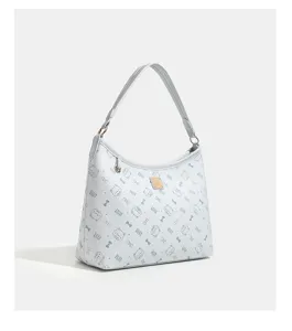 Close-up detail of the white shoulder hobo bag featuring cute cat print and sleek strap.