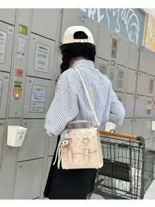 Retro commuter backpack with cute cat print, chic small double shoulder bag for daily fashion.