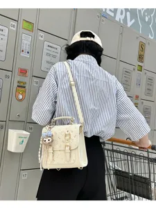 White vintage mini backpack women chic shoulder bag stylish commuter casual daypack.