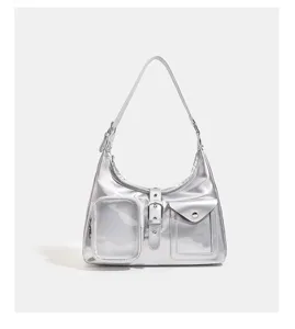 Silver metallic hobo shoulder bag with clear card pocket and buckle detail for daily commute.
