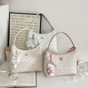 Chic half-moon shoulder bag set for women, featuring cute cat print and plush cat pendant.