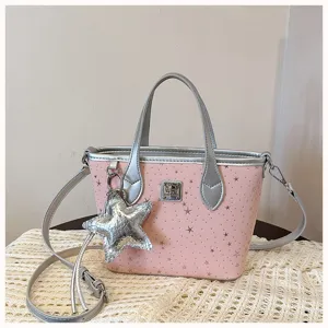 Borsa a mano rosa con stampa di stelle, manico argento e tracolla, elegante per donna.