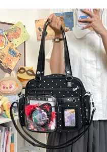 Black polka dot canvas ita bag featuring clear window for anime merch and daily school use.