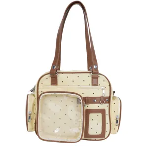 Detailed view of the cute polka dot ita bag with clear window and brown straps for daily use.